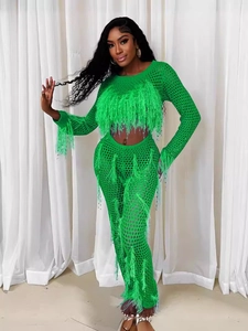 Neon green two-piece crochet set with long sleeves, fringe tassels and hollow-out mesh design