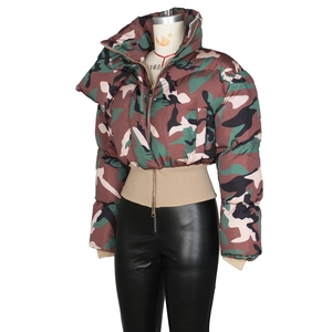 Detailed view of women's camo jacket featuring a wide stand-up collar and ribbed hem