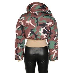 Back view of a cropped camouflage jacket showing beige ribbed cuffs and waistband detail