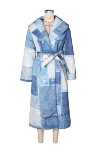 Detail of double-breasted long coat with denim patch print and waist tie on mannequin