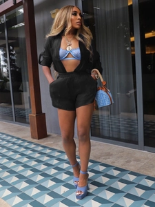 Women's black sheer long sleeve shirt and shorts set with light blue lace bralette