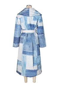 Back view of a long belted denim patchwork print hooded coat on a white mannequin