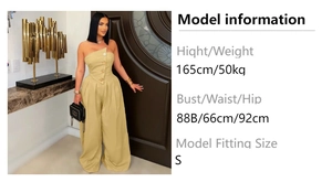Detail of khaki bandeau top with large gold buttons and high-waist wide-leg trousers