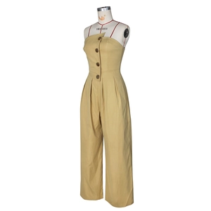 Detail of khaki strapless jumpsuit with diagonal button placket and wide legs