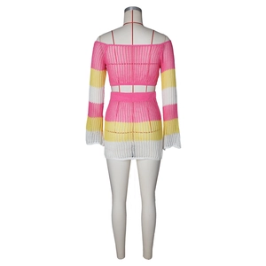 Detail of handmade crochet striped two-piece set with pink yellow white textures