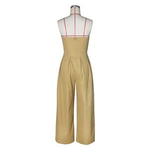 Detail view of khaki tube wide leg jumpsuit showing back zipper and waist pleats