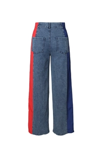 Rear view detail of high-waisted wide-leg jeans with red and blue side stripes
