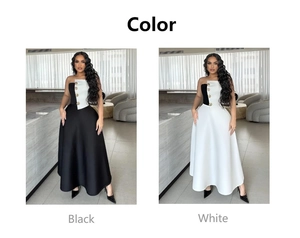 Detail view showing black and white tube top dress sets with decorative gold buttons