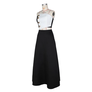 Detail of color-block tube top with gold buttons and high-waist A-line skirt set