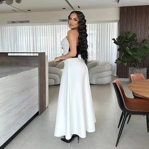 Chic two-piece set featuring a black bandeau top and a high-waisted white A-line maxi skirt