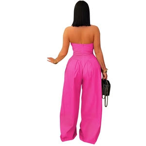 Back view of a rose pink strapless jumpsuit with high waist and invisible zipper detail