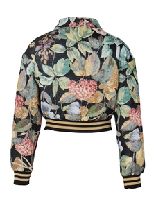 Detailed back view of a vintage floral jacquard jacket with striped ribbed cuffs