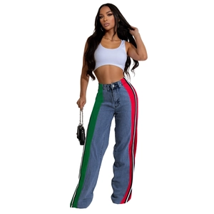 Detail of color-block striped side ribbons on high-waisted wide-leg denim jeans
