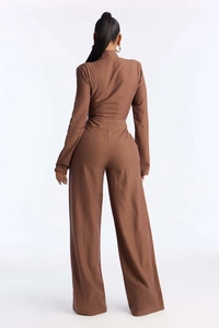 Back view of brown vertical stripe wide-leg jumpsuit with waist belt for office wear