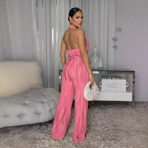 Pink satin halter neck jumpsuit with backless design and wide legs for women