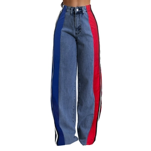 Detail of high waist wide-leg jeans with color block denim blue and side stripes