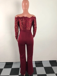Detailed close-up of wine red lace off-shoulder jumpsuit with elegant embroidery and back zipper