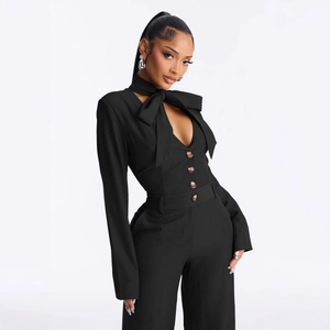 Elegant black pinstripe long sleeve jumpsuit with bow tie neck and high waist design