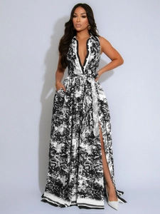 Robe longue élégante à imprimé floral noir et blanc avec décolleté en V et fente haute