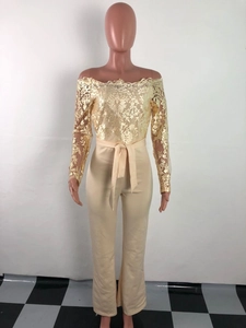 Detail of elegant off-shoulder lace bodice and tie-waist on champagne jumpsuit