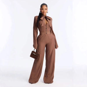 Elegant dark brown pinstripe wide-leg jumpsuit with long sleeves and bow neck detail