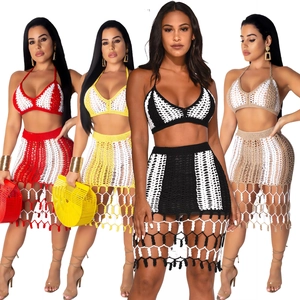 Detailed knit patterns and long tassels on Bohemian crochet beach set in four colors