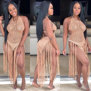 Women's light brown crochet beach cover-up with halter neck and long fringe tassels