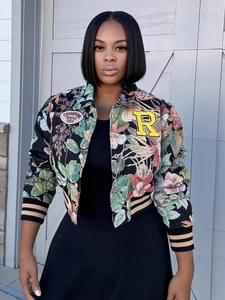 Women's vintage floral bomber jacket with R patch and Champions Hustle embroidery