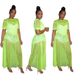 Neon green sheer mesh maxi dress with short sleeves and high waist, front and side view