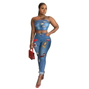 Sexy two-piece denim set with cartoon patches, crop top and high waist jeans