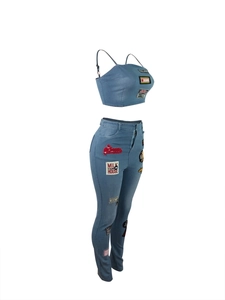 Close-up of light blue denim set with American vintage embroidery patches on white background