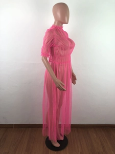 Detail view of hot pink sheer mesh dress with lettuce edge collar and pleated textures