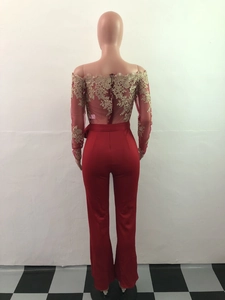 Back view of elegant off-shoulder lace jumpsuit with red satin and gold floral embroidery