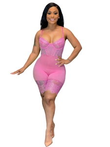 Detailed view of pink lace bodysuit with spaghetti straps and sheer floral embroidery