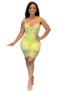 Detailed lace texture and scalloped edges of the bright yellow sexy lace romper