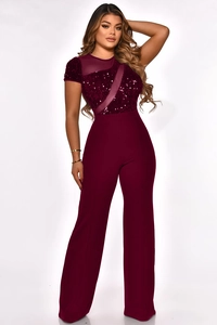 Detail view of burgundy sequined mesh patchwork on short sleeve wide leg jumpsuit