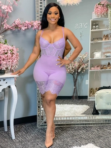 Chic purple lace bodysuit with spaghetti straps and floral detailing in a full-body view