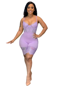 Detail of purple lace trim on hem and satin patchwork of this sexy slim bodysuit