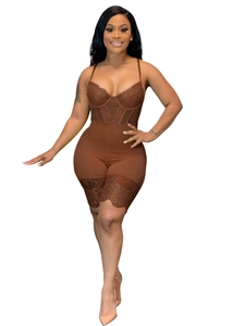 Close-up of brown bodysuit with intricate floral lace panels and shaping cups