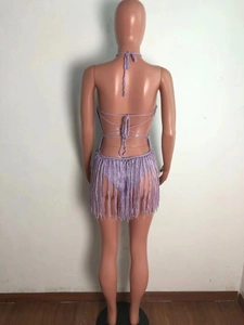 Detailed back view of light purple crochet beach set with long fringe and halter top