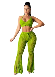 Detail of lime green crochet knit fabric with sheer mesh hollow-out texture for beach set