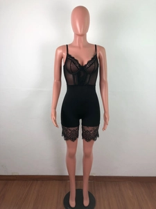 Detail of black lace bodysuit with underwire cups and eyelash lace trim on the hem