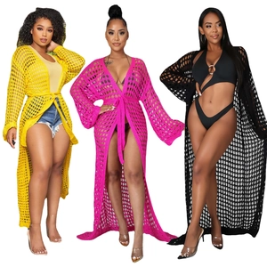 Women's long crochet knit beach cover-up with open mesh design and waist tie belt