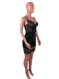Detail of black mesh bodysuit featuring eyelash lace trim and underwire support design