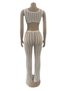 Detailed back view of white crochet two-piece set featuring hollow mesh pattern