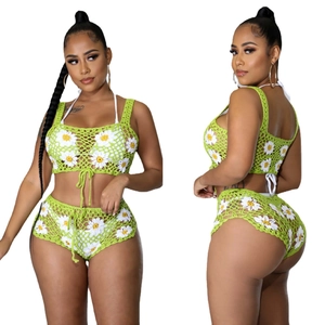 Conjunto de ganchillo verde para mujer con flores de margarita y top tipo halter