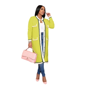 Long green French style knit dress coat with contrasting trim and decorative pockets