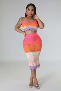 Detail of colorful crochet knit texture and scalloped edges on two-piece beach set