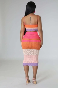 Detail view of the colorful crochet hollow-out pattern on this two-piece knit beach set