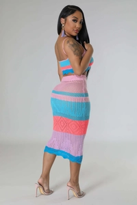 Detailed side view of colorful crochet knit crop top and bodycon skirt set